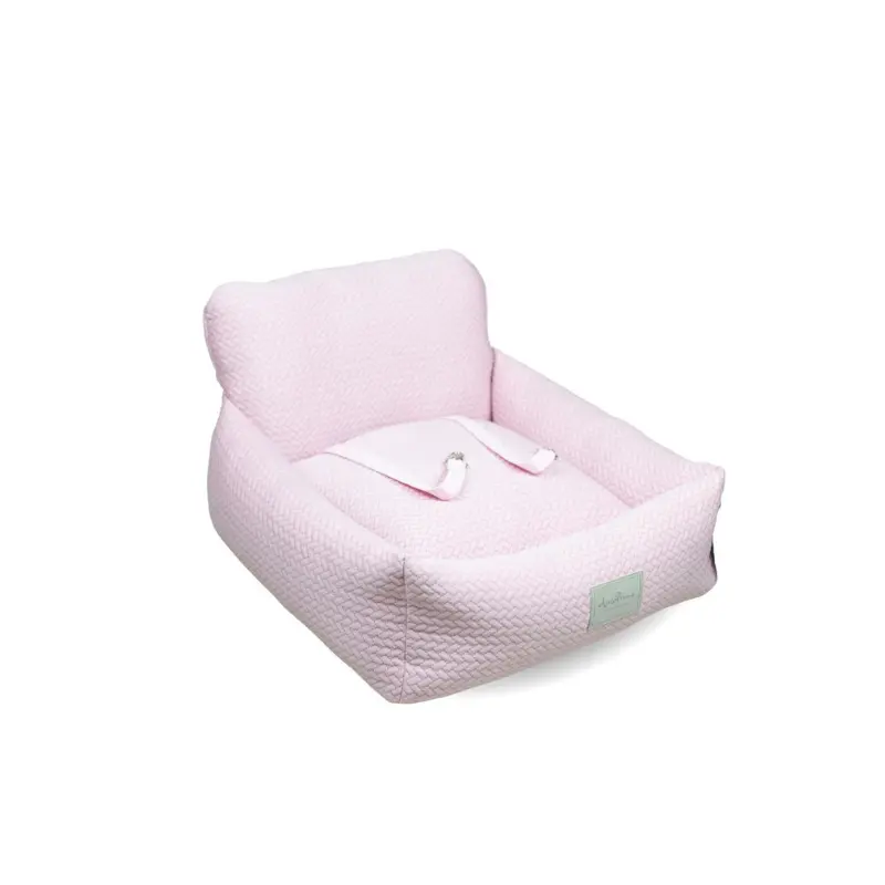 Cama para portar a perro en el coche rosa